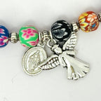Colorful polymer clay beads Bracelet in floral and abstract patterns.