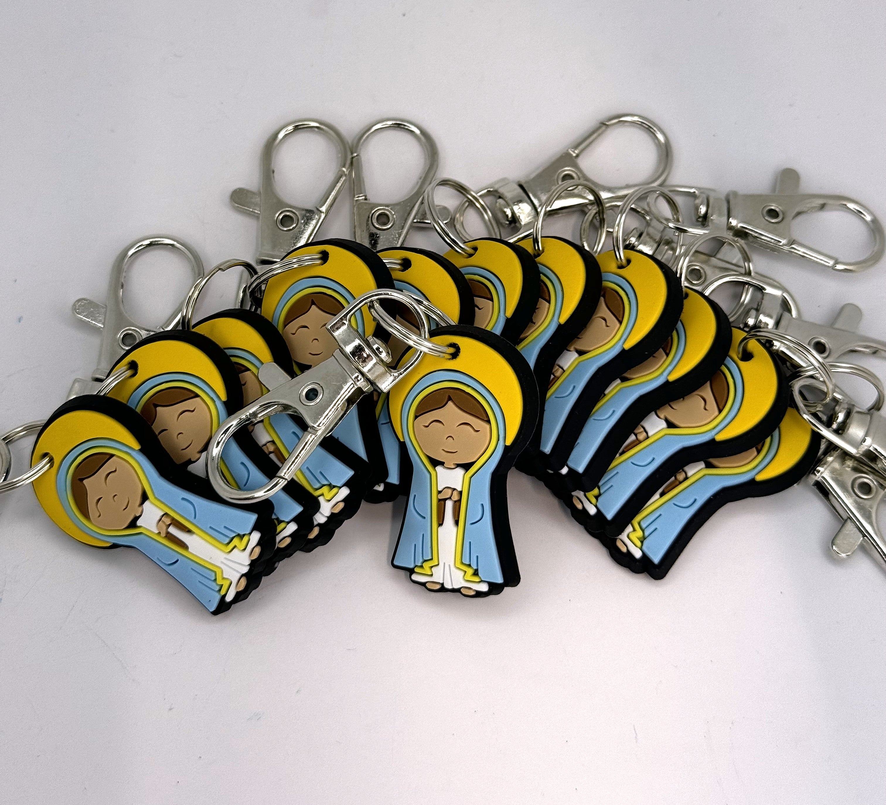 Bundle of Joy: 12 Pcs Pick your favorite Uplifting Lil Saint Key Chain.  Soft PVC Small Key Chain Bundle