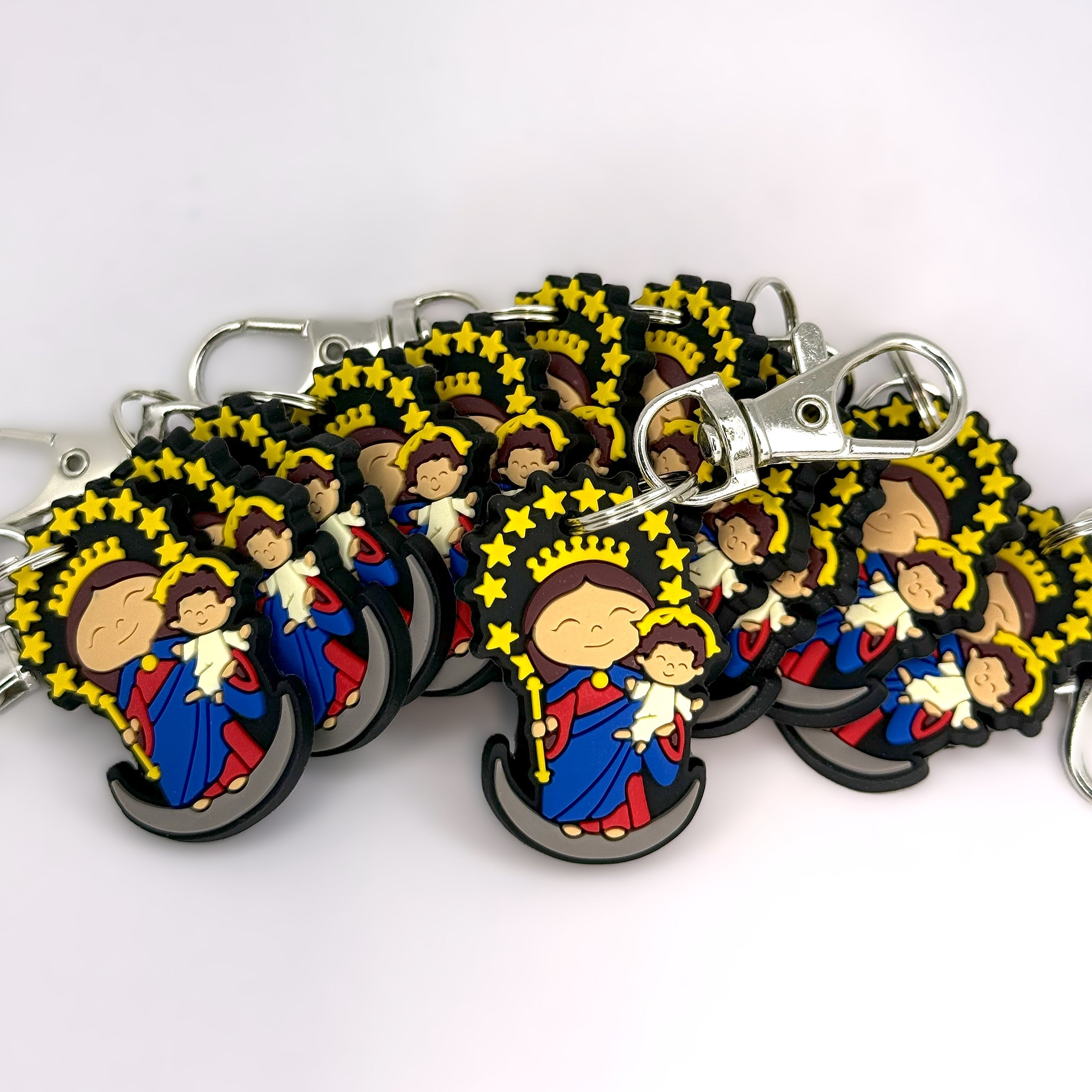 Bundle of Joy: 12 Pcs Pick your favorite Uplifting Lil Saint Key Chain.  Soft PVC Small Key Chain Bundle